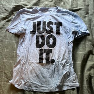 The Nike Tee shirt, size medium